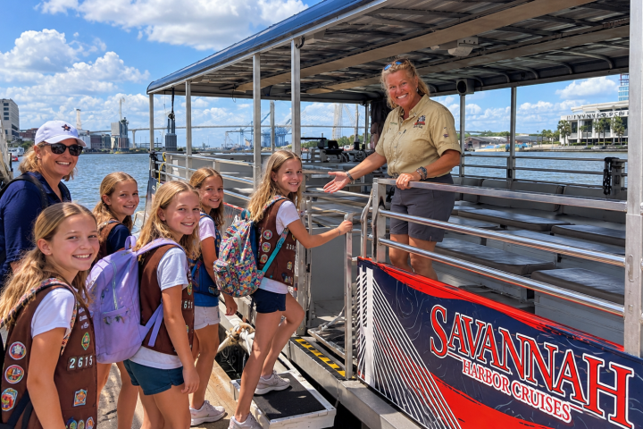 Group of girls boarding a Savannah Harbor Cruises tour boat.